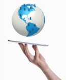 hand holding flat tablet with global workforce hand holding flat tablet with global workforce